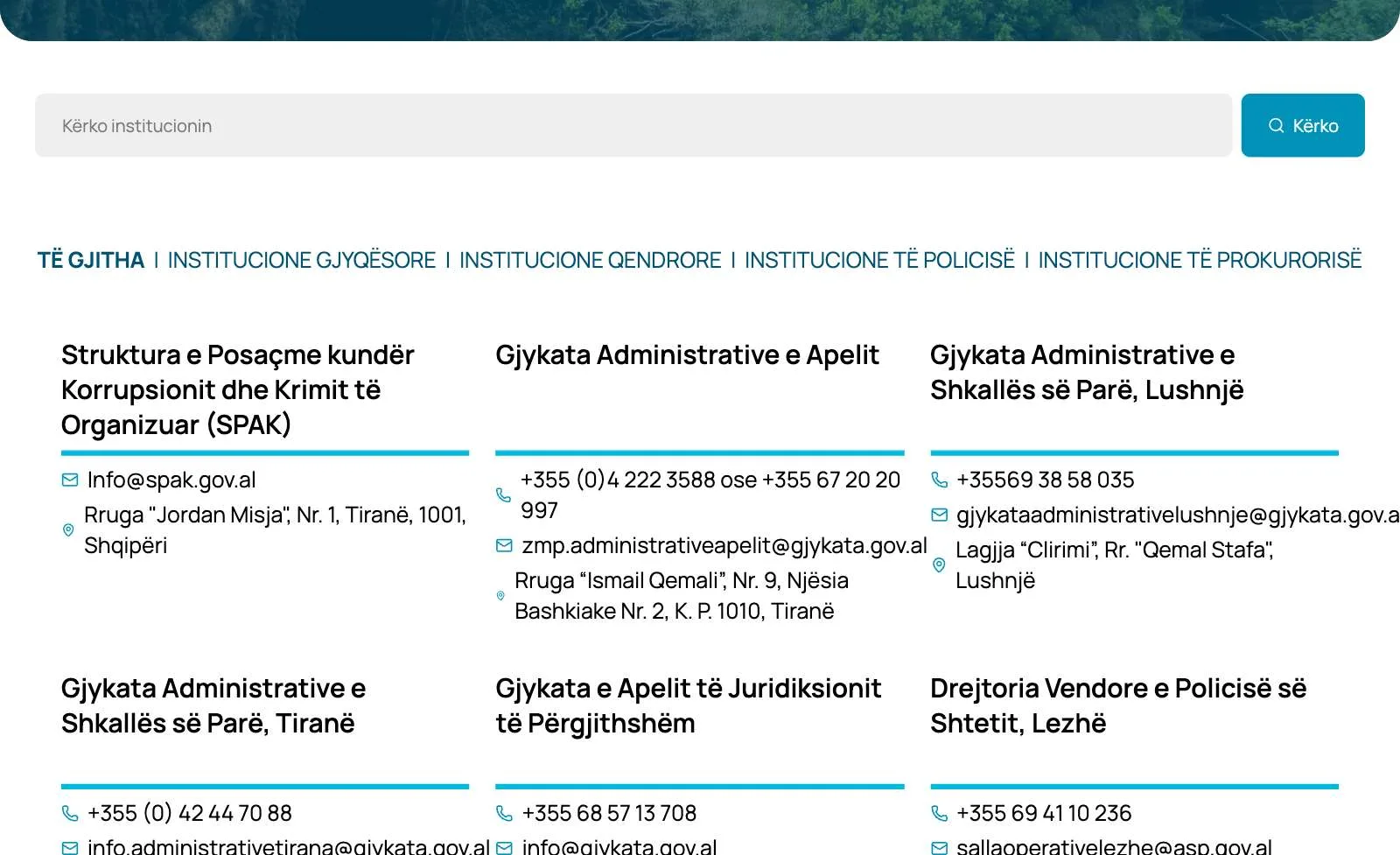 The institutions directory: tabs for judicial, central, police and prosecution institutions above listings with phone, email and address